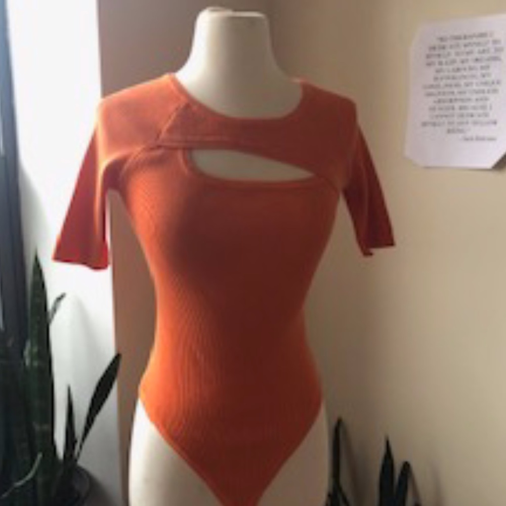 ORANGE BODY SUIT